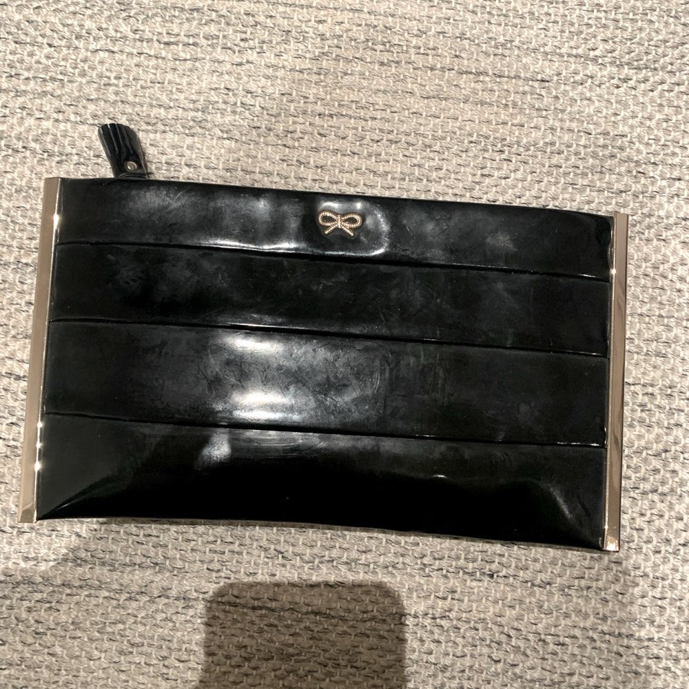 Authentic Anya Hindmarch patent leather clutch with zipper